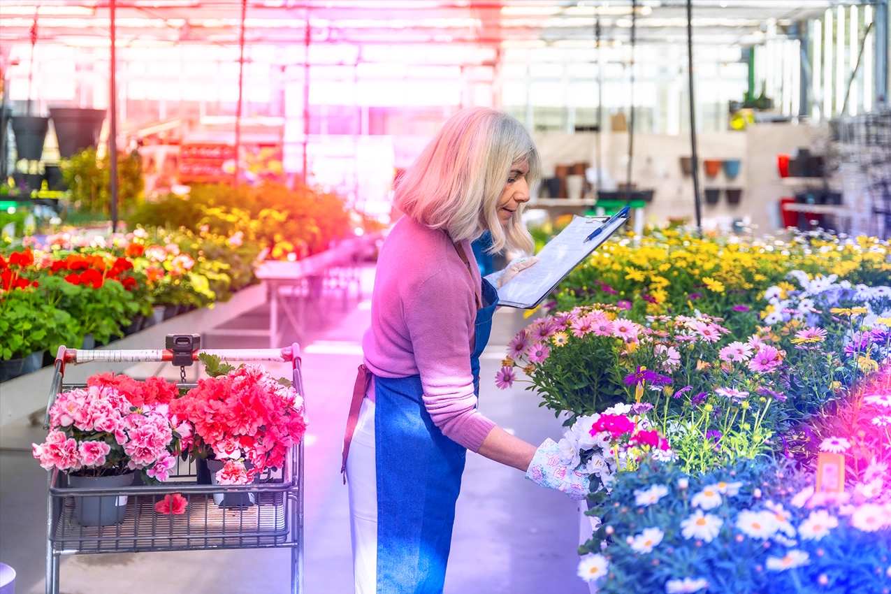 small business owner arranging flowers